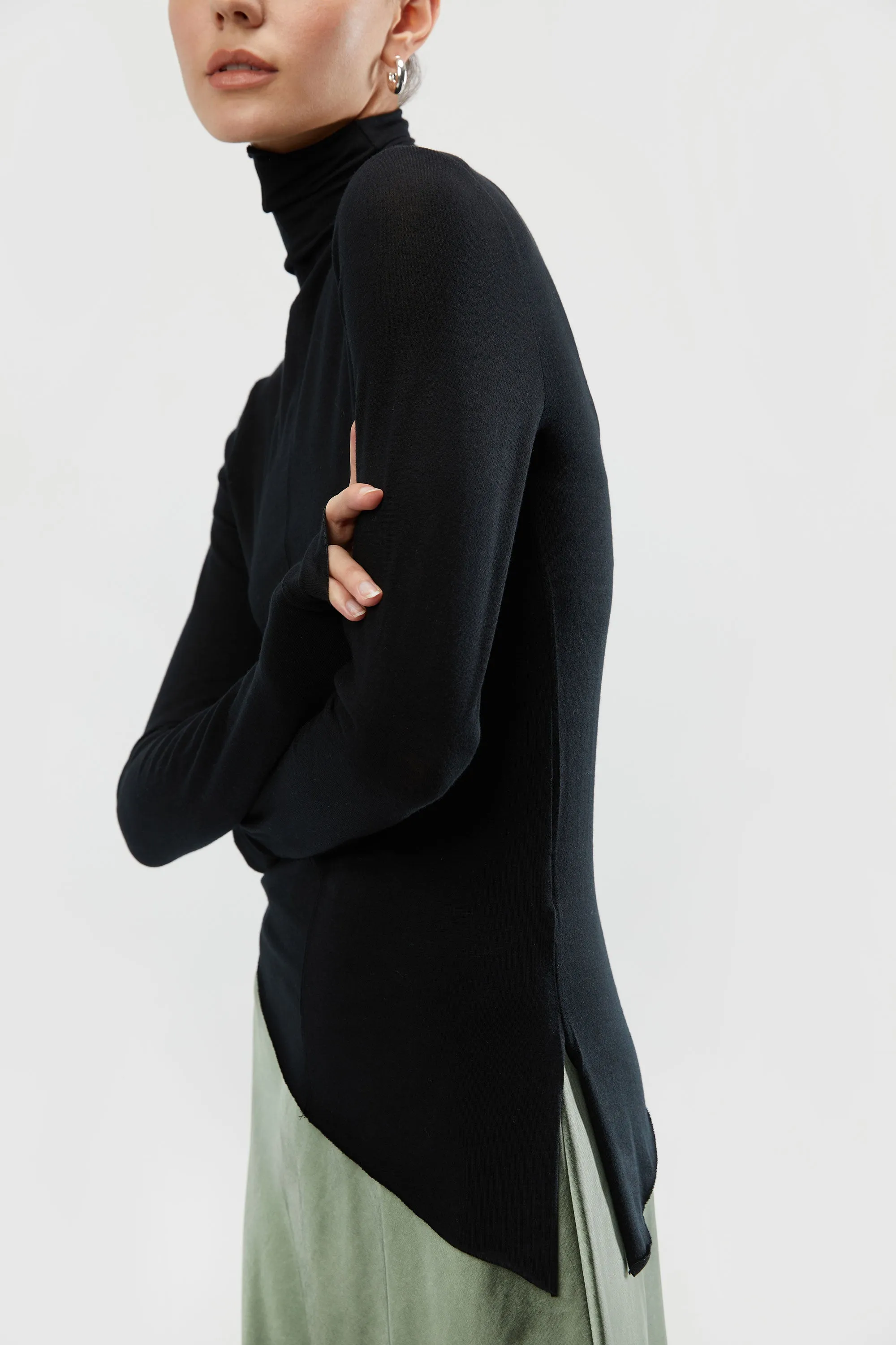 ASYMMETRICAL HEM TURTLENECK TOP