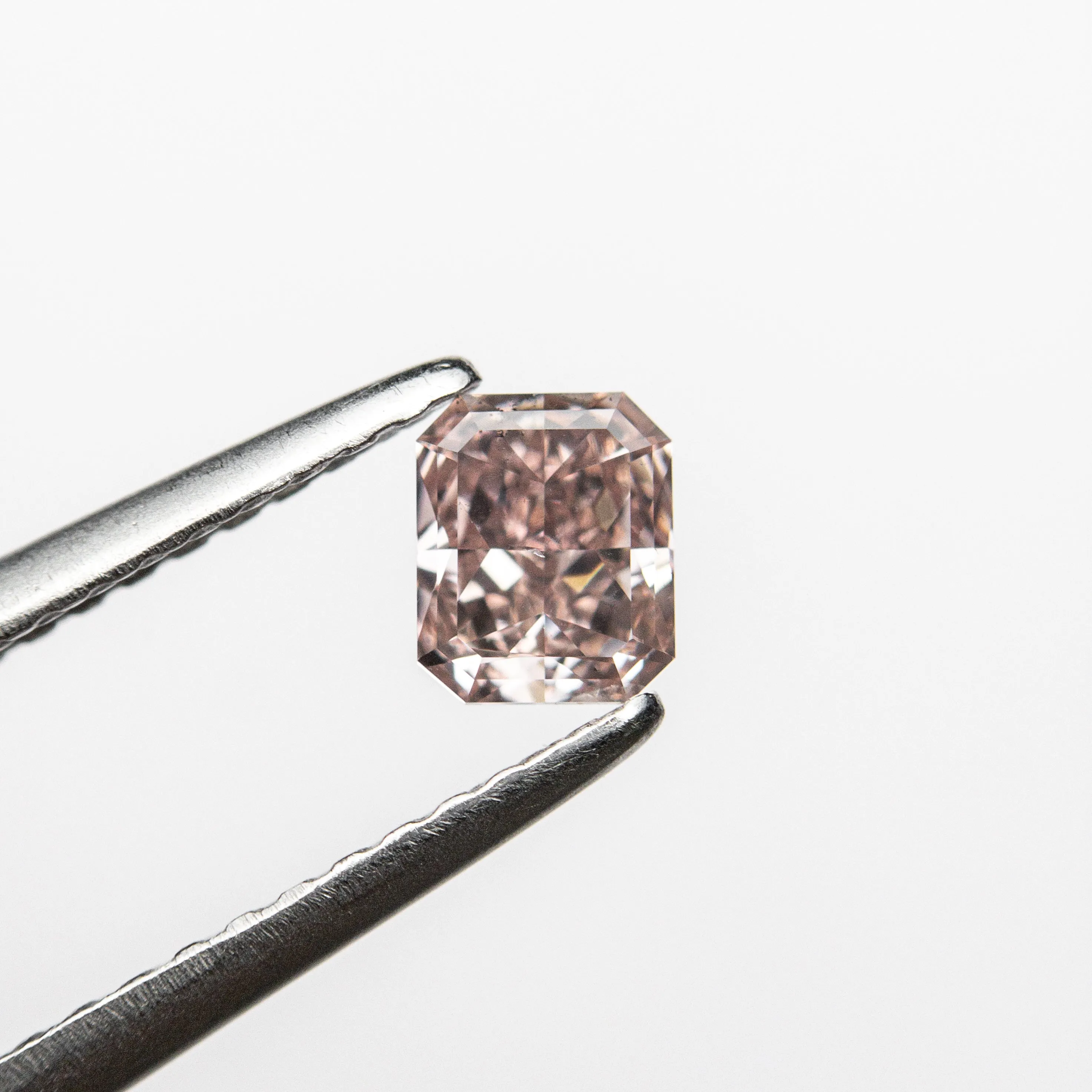 Fancy Orangey Pink Brilliant Diamond - 0.36ct Cut Corner Rectangle