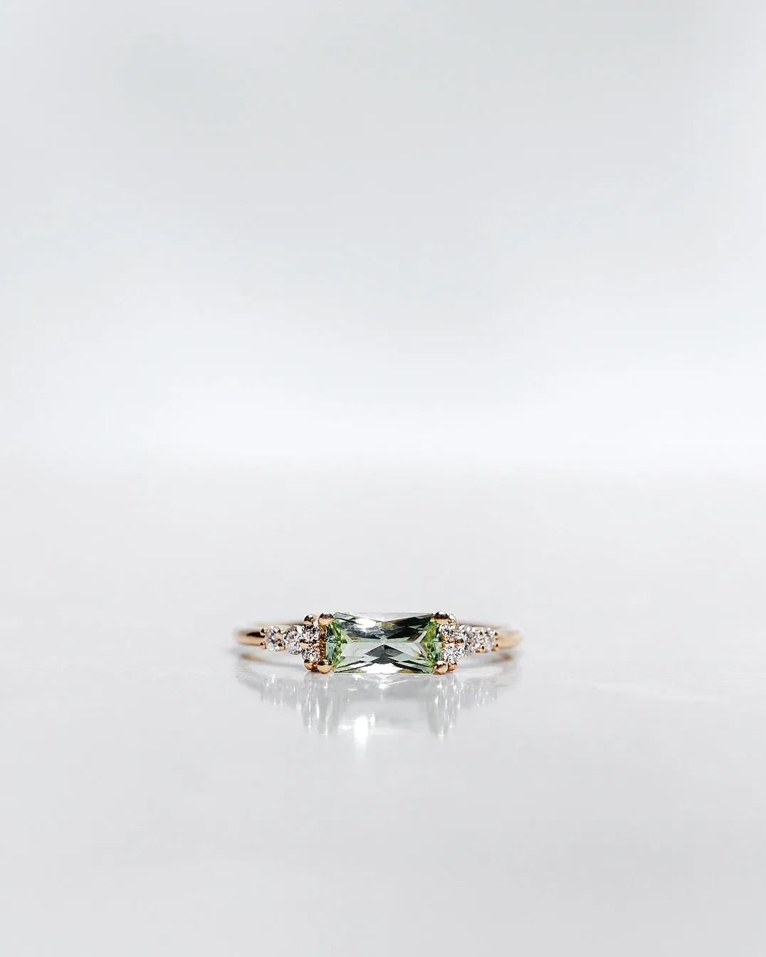 One-Of-A-Kind Cluster Ring with a Radiant-Cut Light Green Sapphire and Brilliant Diamonds (Total 0.94 CT)