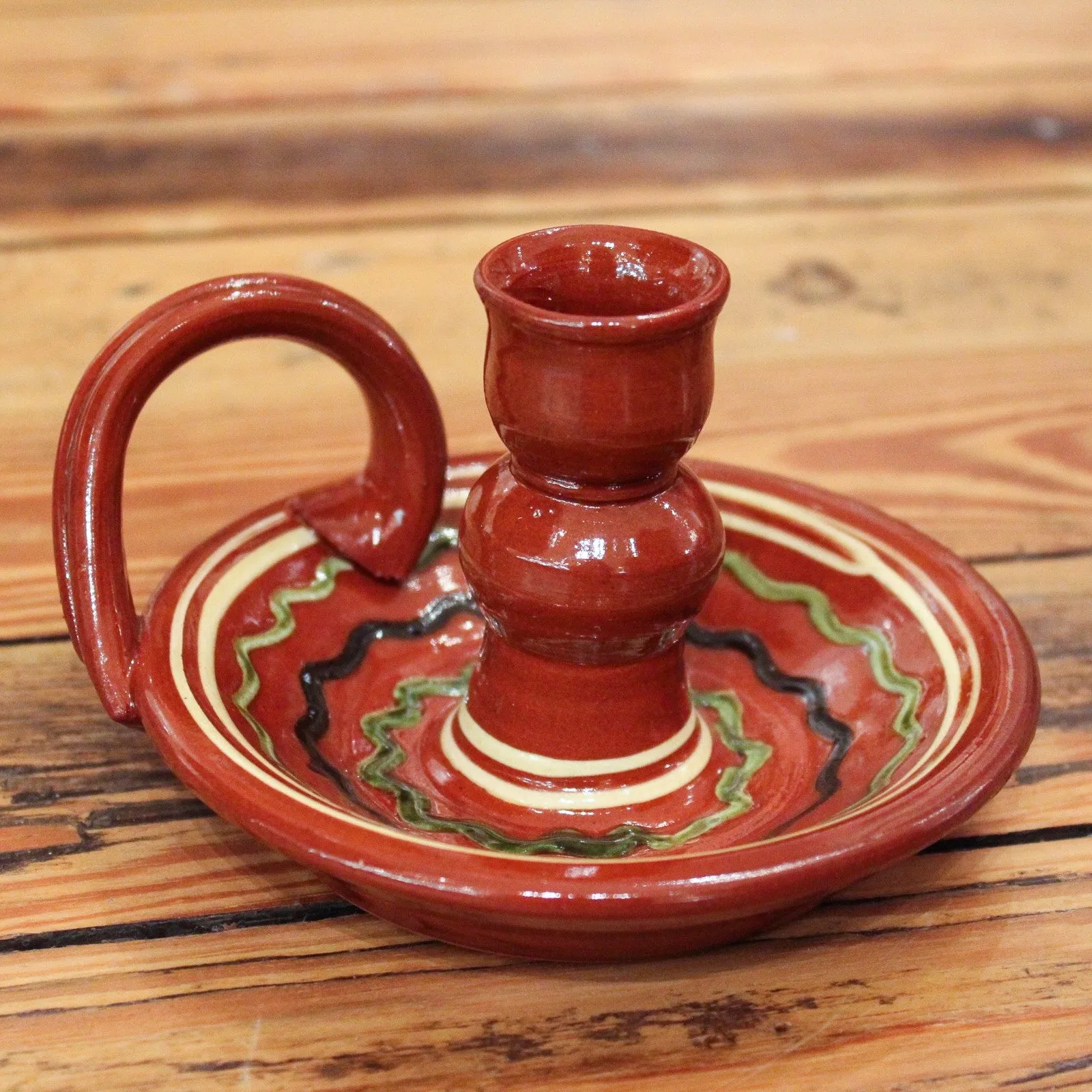 Redware Candlestick Holder with Green and Black Swirl Lines