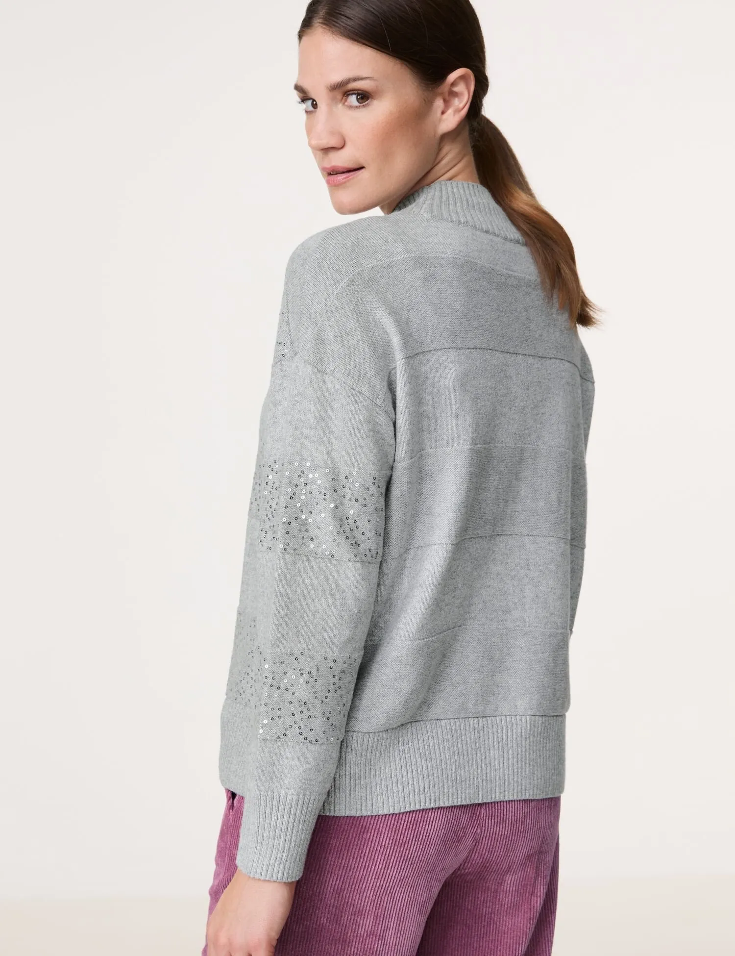 Turtleneck jumper with decorative details