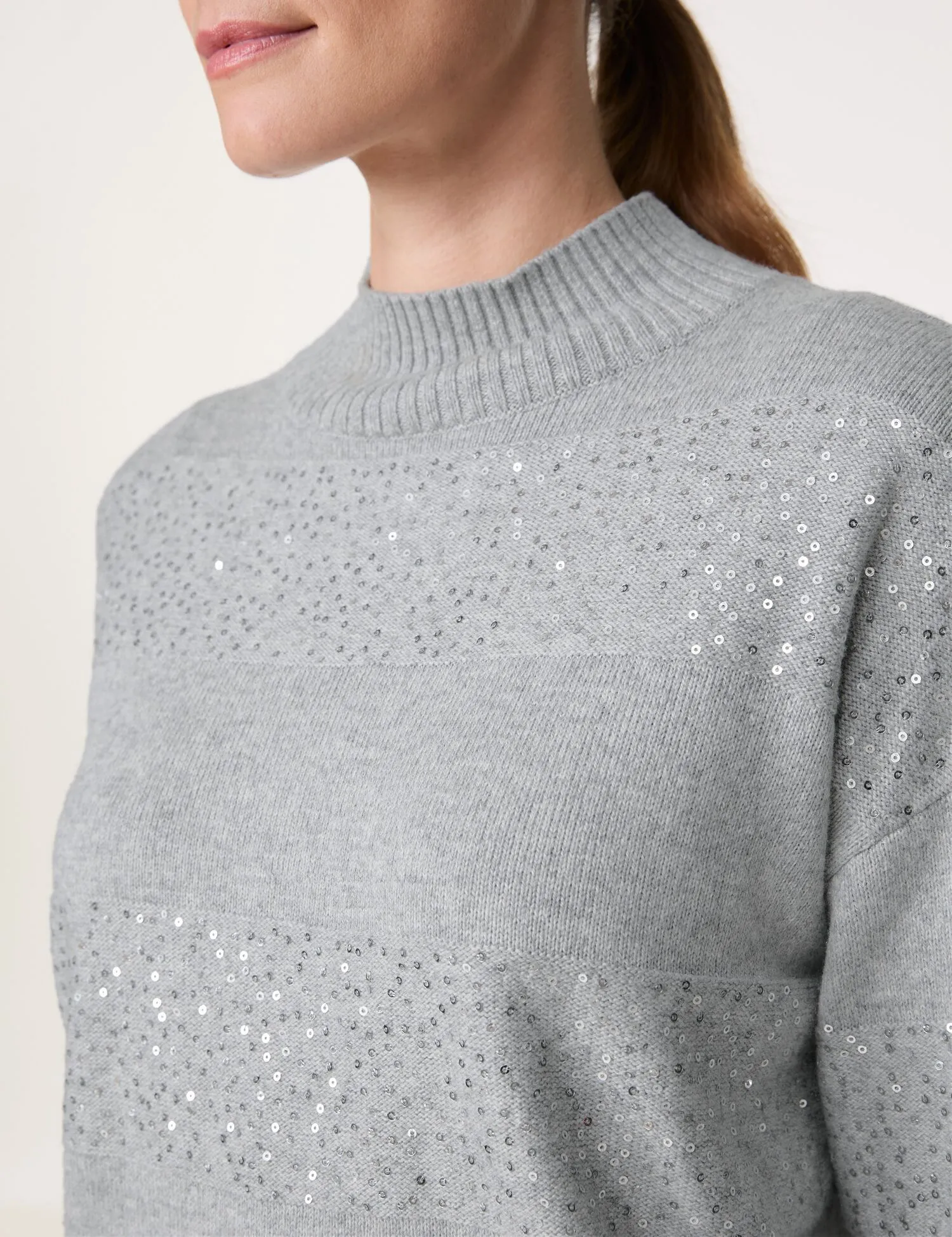 Turtleneck jumper with decorative details